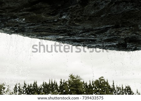 Water drops falling on rocks, rain and moisture, nature