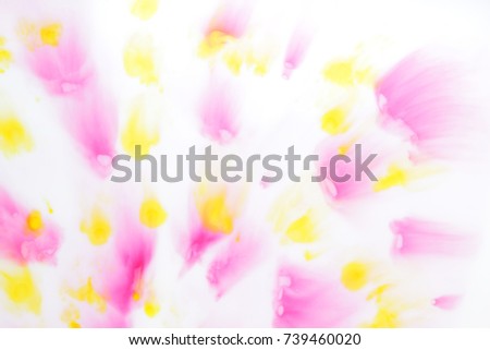 Pink and yellow abstract spots on white background, paint dissolved in milk, art, abstract pink yellow texture on white background for designer