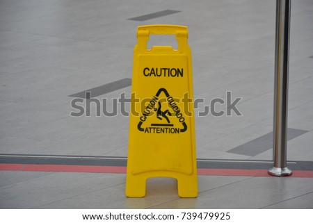 Caution wet floor - slippery floor - yellow sign