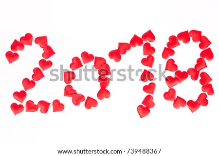 Happy new year number 2018 made of red hearts isolated above white background.