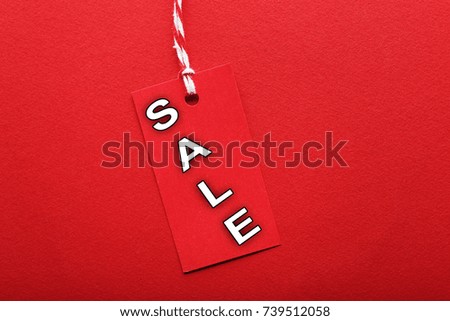 Sale tag on red background