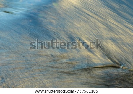 water background with Sea low angle view, river, wave Close up Nature background. Soft focus with selective focus blur.