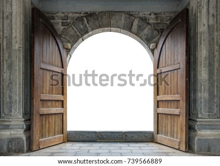 Large wooden door open in rock castle wall Royalty-Free Stock Photo #739566889