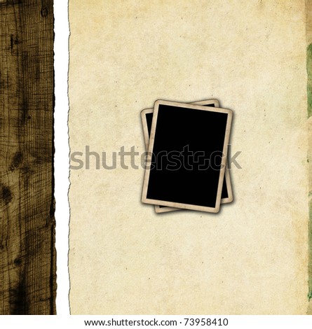 Blank photo frames on aged paper