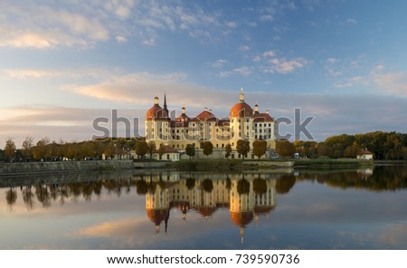 Moritzburg Castle lit by the setting sun in the autumn