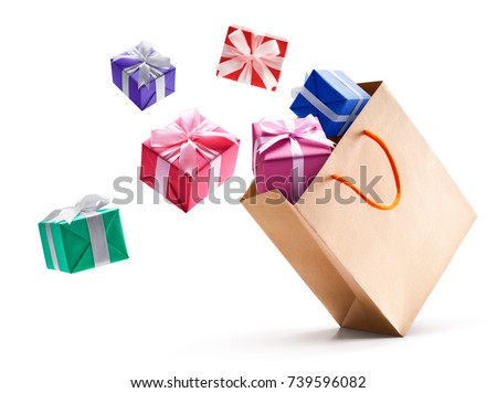 Gift boxes pop out from paper bag isolated on white background Royalty-Free Stock Photo #739596082