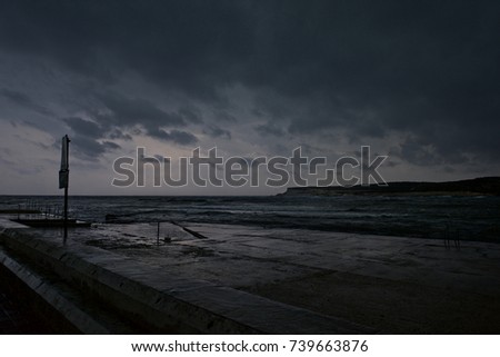 Big storm coming to Malta. View to the sea. Dramatic sky and dark morning before storm. Dangerous weather conditions