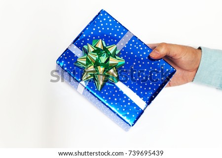 Gift hold on hand with white background.