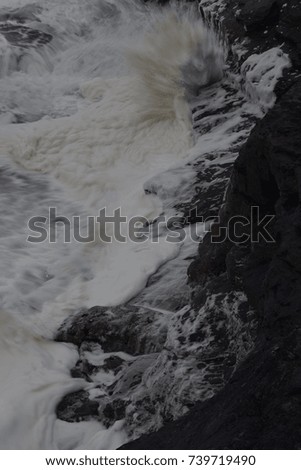 Sea foam and cliffs Cornish Coast