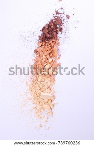 Cosmetic Powder Scattered on white background