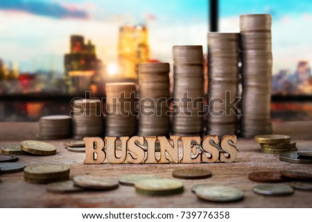 Wood with heap and stack of Coins for Business and Finance Concept