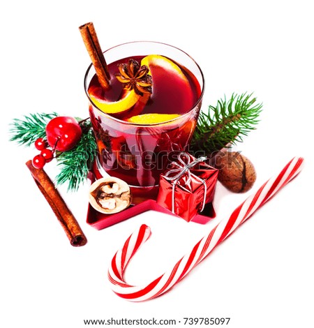 Christmas Hot mulled wine for winter with spices isolated on white background, traditional drink on winter holidays, closeup
