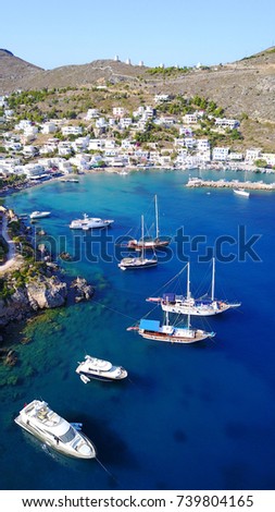 Aerial bird's eye view photo taken by drone of yachts docked in beautiful Greek island in Dodecanese