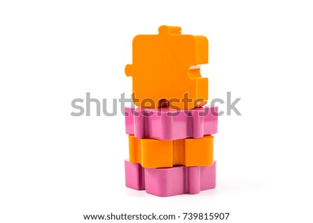 Colorful jigsaw puzzles on the white background.