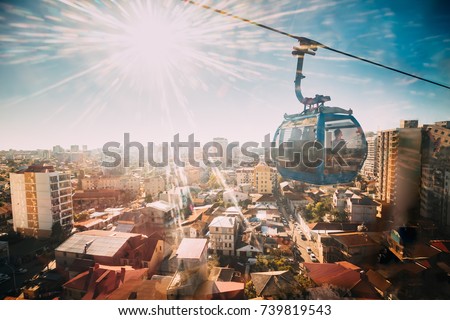 Batumi, Adjara, Georgia.  Sun Shining Through Window In Aerial Lift Cableway In Sunny Summer Day. Pendant Road Is Local Landmark Royalty-Free Stock Photo #739819543