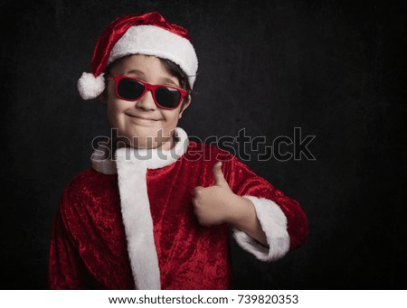 funny boy with sunglasses on christmas