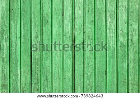 Old wood background. Texture green boards rough, shaggy, scabrous, matt. Timbered fence crac. For design solutions, interior, advertising, presentation, background, label, web, screens. Trendy effect.
