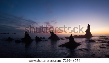Beautiful aerial sunset view of a scenic landscape at the Ocean Coast. Taken at Shi Shi Beach in Neah Bay, West of Seattle, Washington, United States of America. Drone Picture