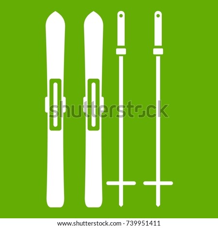 Skis and ski poles icon white isolated on green background. Vector illustration