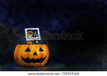 Happy Halloween background toys for kid look cute and funny style presents by pumpkin Jack and kitty cat and friends playing trick or treat stand front of the armchair and the Gothic tree.Copy space
