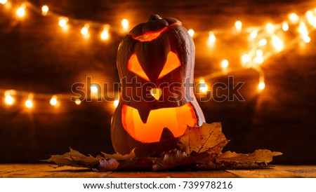 Photo of halloween pumpkin cut in shape of face