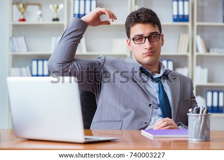 Businessman sweating excessively smelling bad in office at workp Royalty-Free Stock Photo #740003227