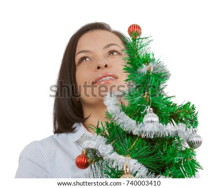 New Year Concept. Beautiful Woman Dream with Decorated Christmas Tree on a white background