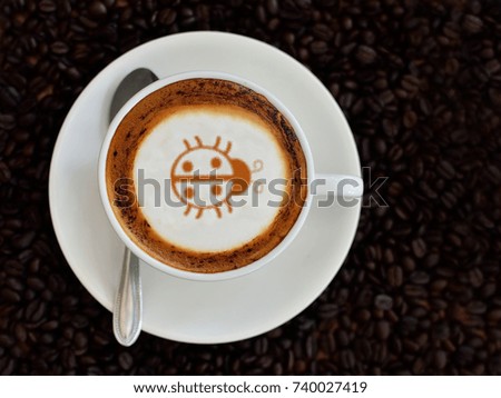 Coffee cup with bug picture on top
