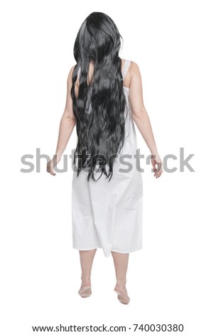 Mystical ghost woman in white long shirt back isolated