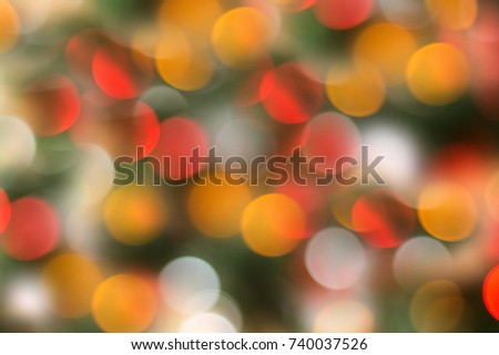 defocused christmas lights background with coloful bokeh.