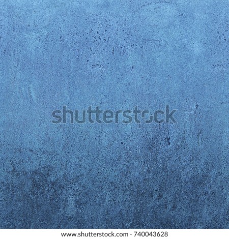 Grain blue paint wall background or texture