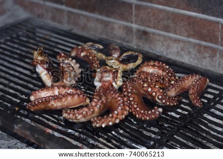 Pieces of a octopus on a grill, picture from Scala Potamai in the Northern Greece.. 