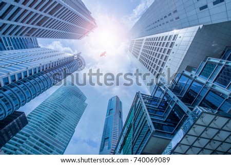 Singapore city business center financial . Panoramic and perspective view light blue background of glass high rise building skyscraper commercial of future. Business 