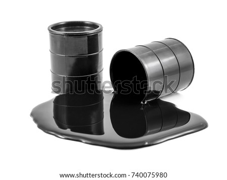 Oil is poured out of the black barrel and full barrel of oil. Isolated on white. Royalty-Free Stock Photo #740075980