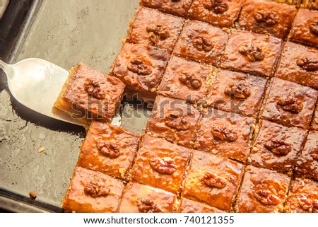 Baklava with nuts and honey. Selective focus.