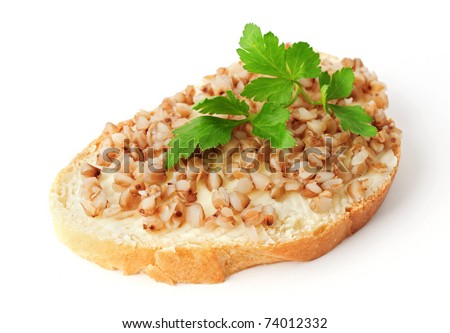 Sandwich made of bread with butter and buckwheat. Concept of food deficit.