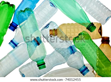 close up of empty used plastic bottles on white background with clipping path