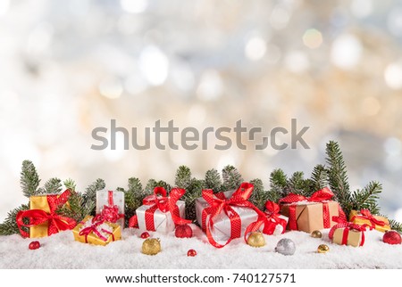 Christmas gifts on abstract blurred background, close-up.