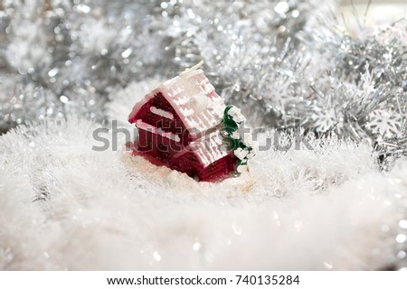 Christmas red house in winter setting. Xmas house abstract background. Winter holidays concept.