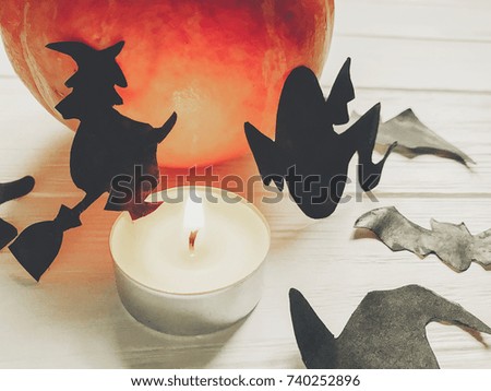 halloween. happy halloween concept. pumpkin with witch ghost bats and spider black decorations on white wooden background. cutouts for autumn holiday celebration. seasonal greetings