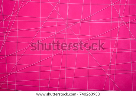 texture of a pink abstract wall with white geometric lines
