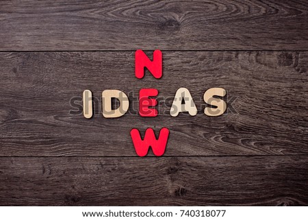 New ideas words from letters wooden background