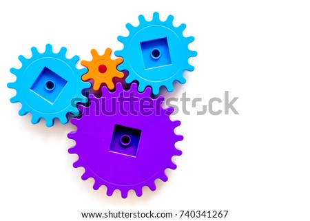 moving forward concept, ideal operating principle with gears and wheels on white background top view mock up