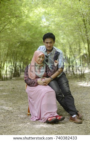 Muslim pregnant couple. husband and wife. selective focus