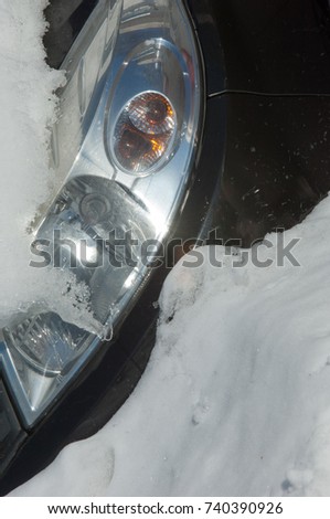 Winter landscape. snow covered car. Sunny day, heavy frost.