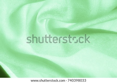 Texture, background, pattern. Fabric - silk light. Pale green fabric. Beautiful picture. Vintage Pale Fabric, suitable for lining. Polyester. Very pale green, or the right color for pies with keys.