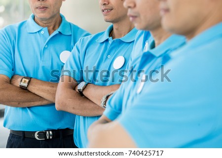company team works with their hands folded Royalty-Free Stock Photo #740425717