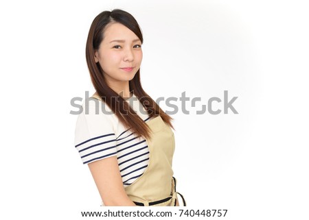 Smiling woman in apron