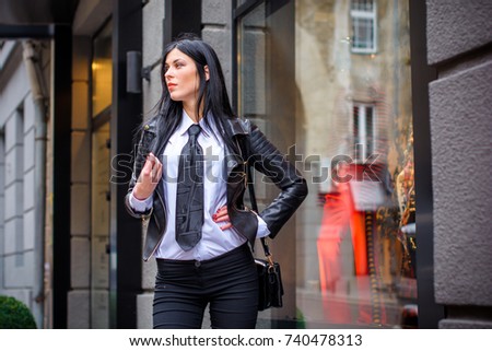 Pretty style woman goes shopping at city center for fashion, gift vouchers, shopping and enjoys. Black Friday, Cyber Monday and Boxing Day. Fashion accessories and casual clothes for women