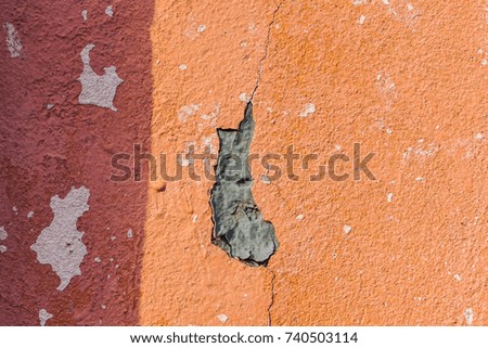 Concrete  wall  textured background  with  peeling off paint. 